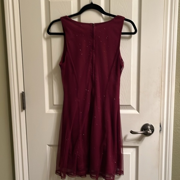 Beautiful holiday or event dresss in Burgundy , Size 2. - Picture 2 of 4
